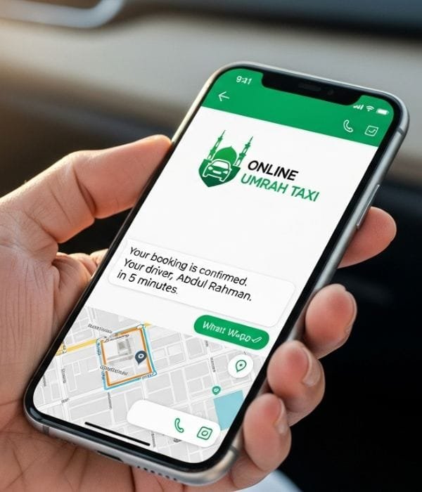 Close-up of pilgrim hand holding smartphone showing WhatsApp chat with Online Umrah Taxi logo, blurred car interior background