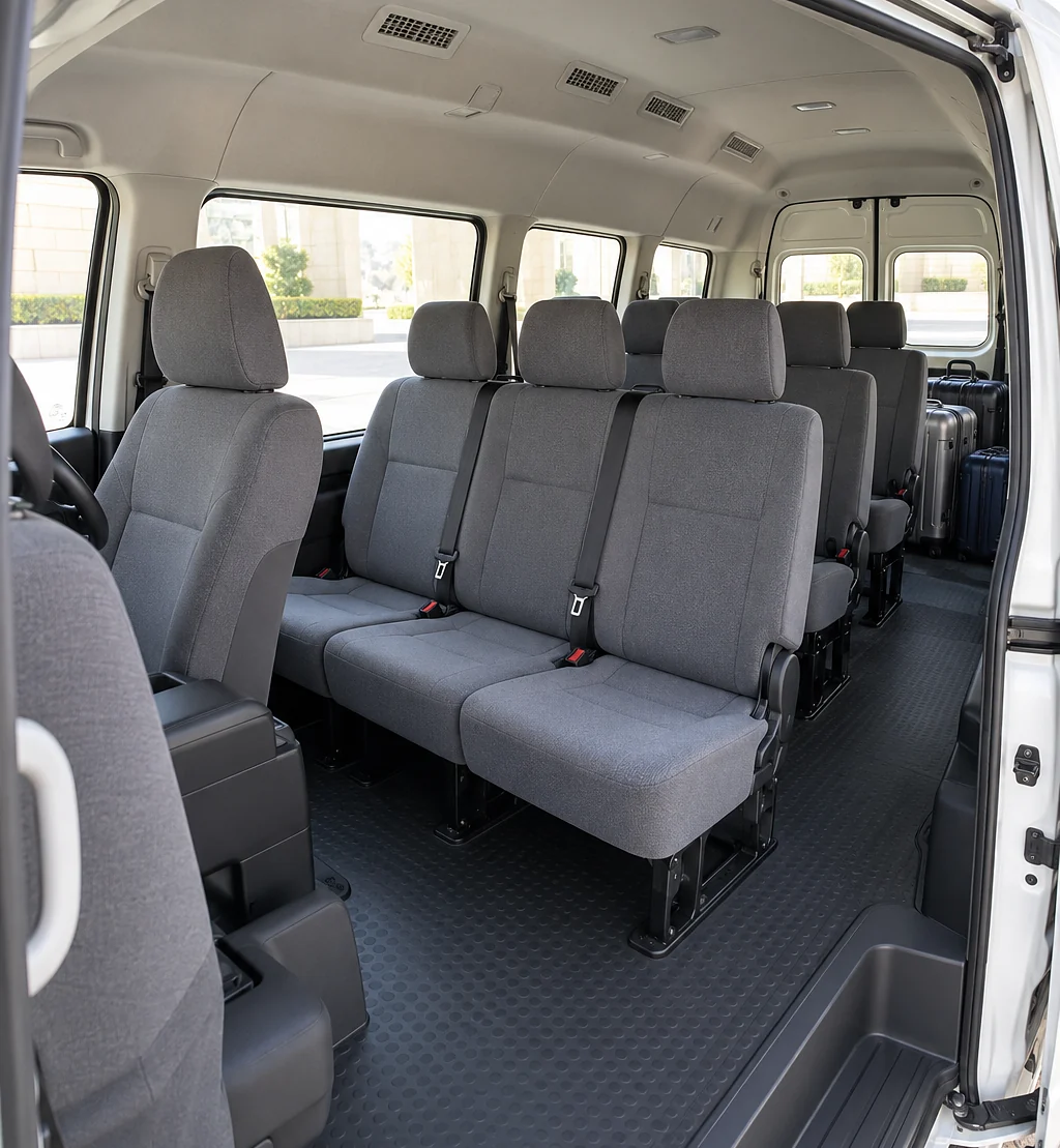 Inside the Toyota Hiace: seats and luggage space for Umrah pilgrims