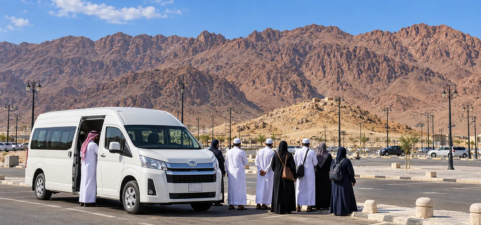 Ziyarat tours: a Toyota Hiace with a pilgrim group at Mount Uhud in Madinah